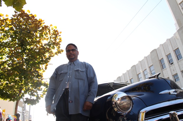  with Lowrider cars a style of cars orginated by Chicanos in the 1950s