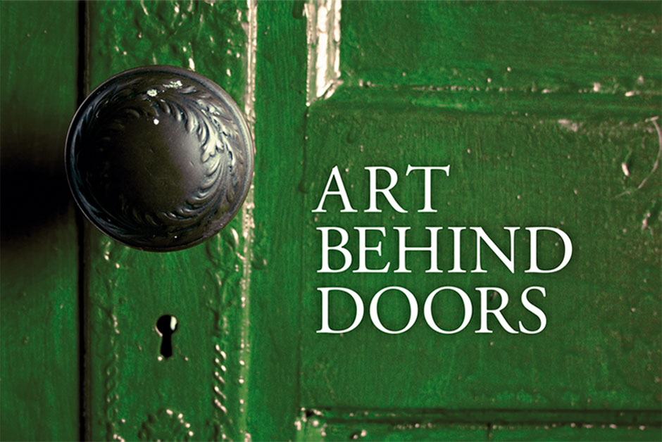 Green door with title Art Behind Doors